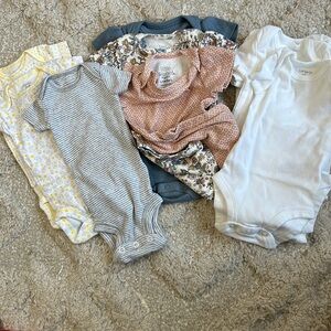 Lot of 11 newborn. Never worn. All. After brands